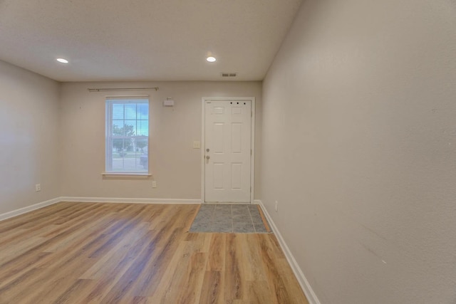 entrance foyer with light wood-type flooring