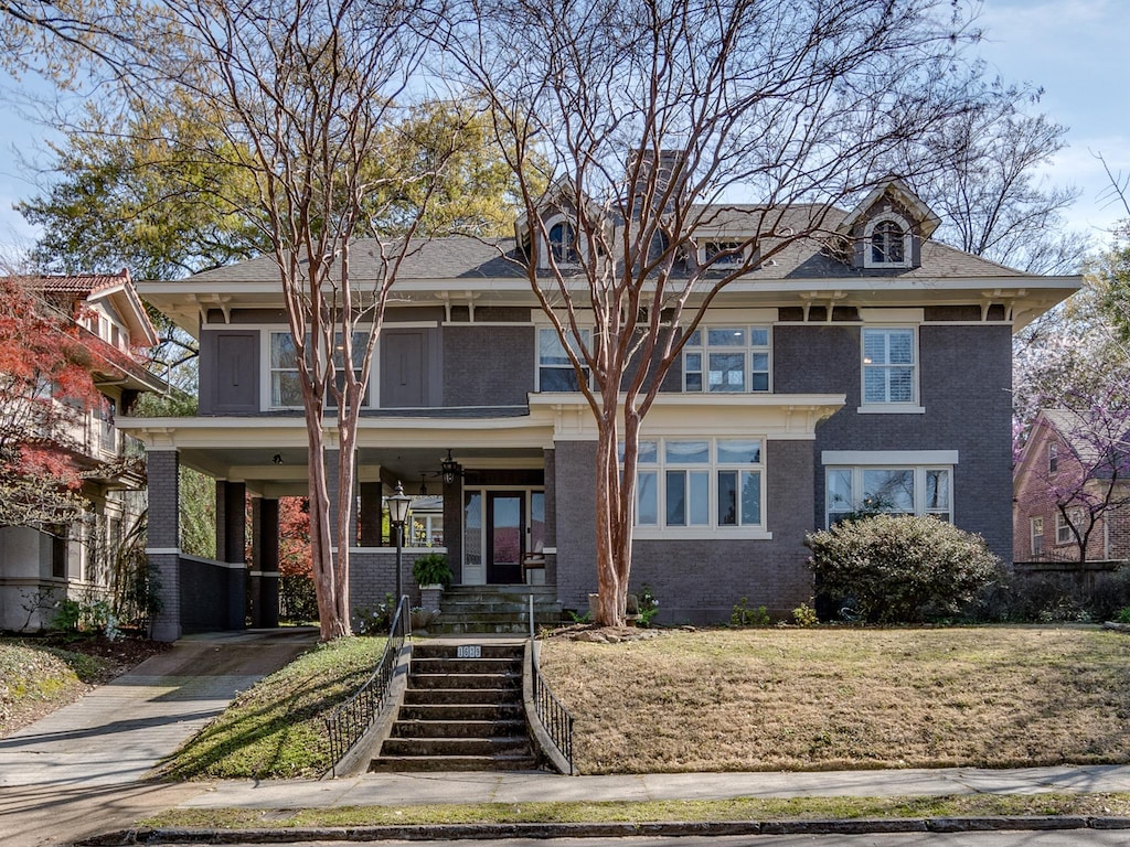 view of front of property with a carport