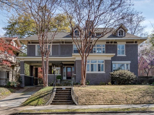 view of front of property with a carport