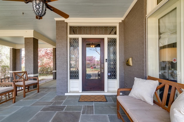 property entrance featuring ceiling fan