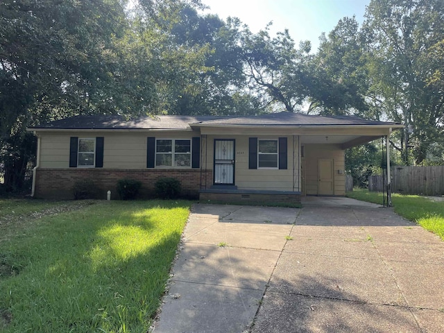 ranch-style home with a front lawn and a carport