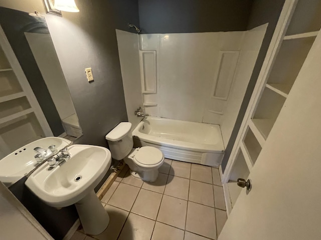 full bathroom with tile patterned flooring, toilet, shower / bathtub combination, and sink