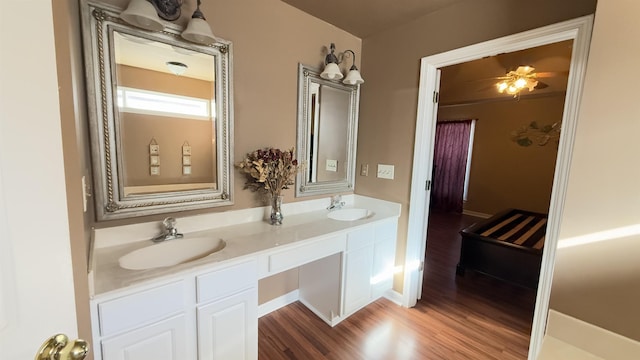 bathroom featuring vanity, hardwood / wood-style flooring, and ceiling fan