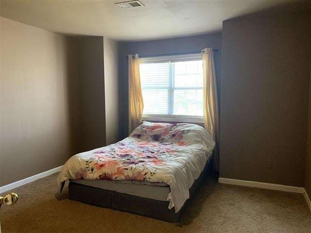 bedroom with carpet