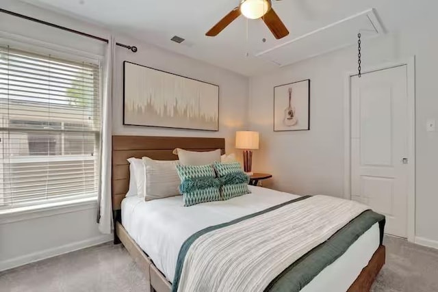 carpeted bedroom with ceiling fan