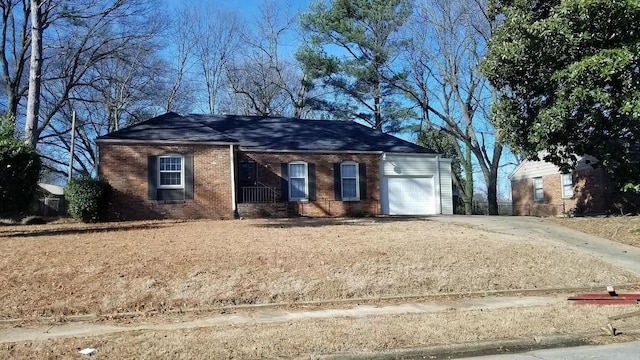 single story home featuring a garage