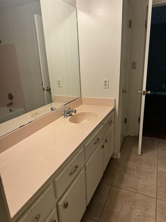 bathroom with vanity and tile patterned floors