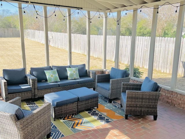 sunroom featuring a healthy amount of sunlight