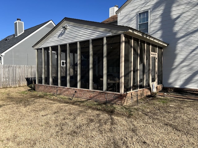 exterior space with a sunroom