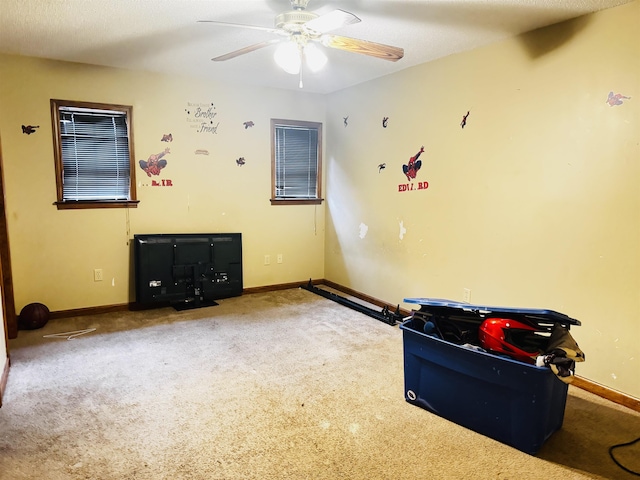 miscellaneous room with carpet and ceiling fan