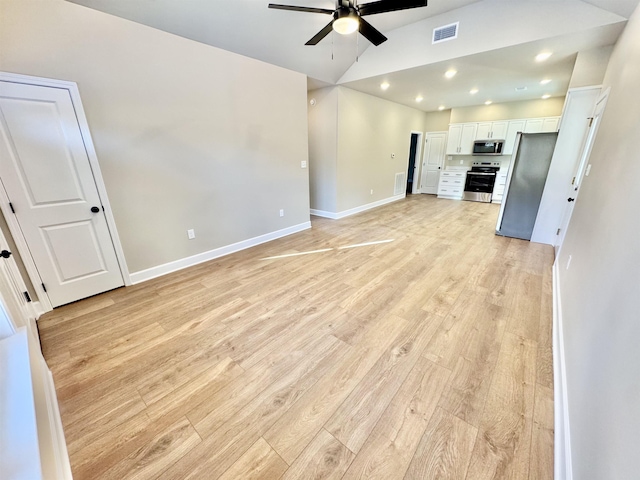 unfurnished living room with ceiling fan, light hardwood / wood-style flooring, and lofted ceiling