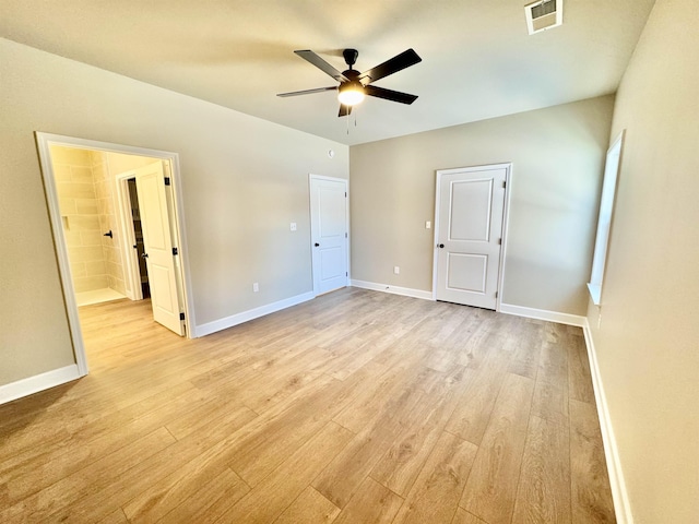 unfurnished bedroom featuring light wood-type flooring, visible vents, and baseboards