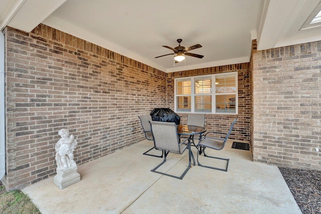 view of patio / terrace featuring ceiling fan