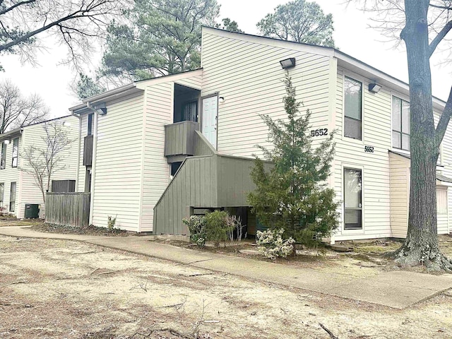 view of home's exterior with cooling unit