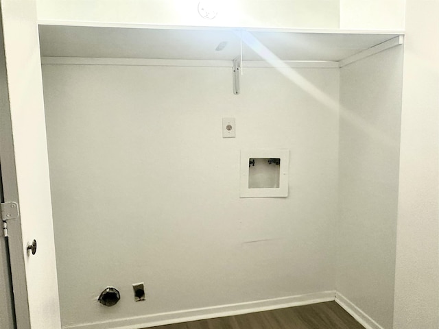 laundry room featuring dark wood-type flooring, hookup for a washing machine, hookup for a gas dryer, and electric dryer hookup