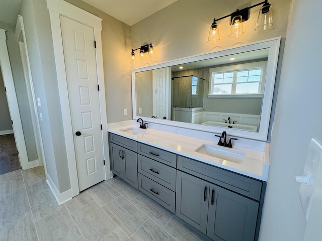 bathroom featuring separate shower and tub and vanity