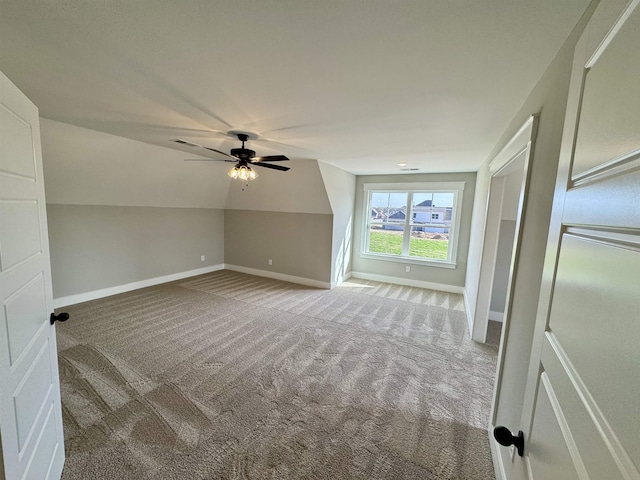 bonus room featuring carpet flooring, ceiling fan, and vaulted ceiling