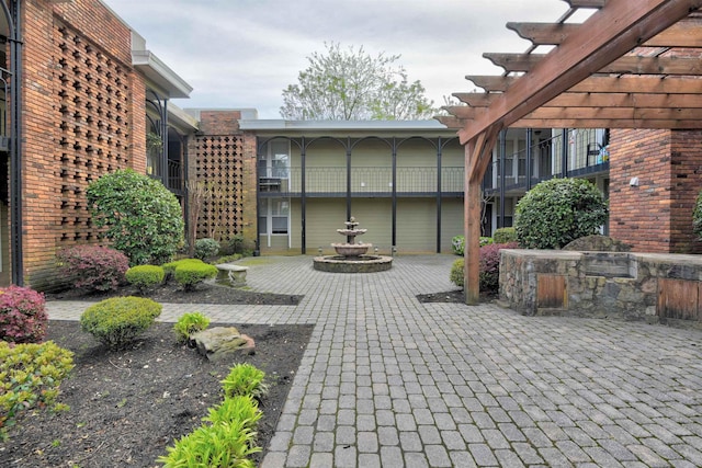 view of patio featuring a pergola