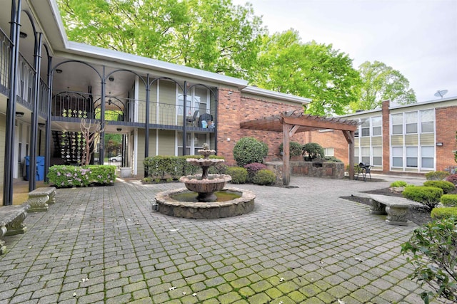 view of patio / terrace featuring a pergola