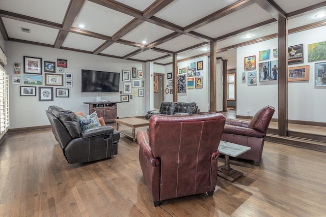 living room featuring coffered ceiling, hardwood / wood-style floors, and beam ceiling