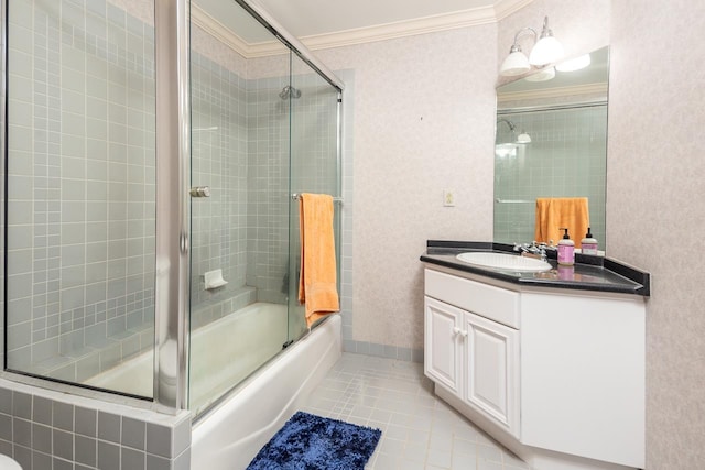 bathroom featuring vanity, tile patterned floors, crown molding, and bath / shower combo with glass door