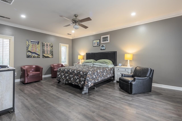 bedroom featuring ceiling fan, crown molding, and dark wood-type flooring