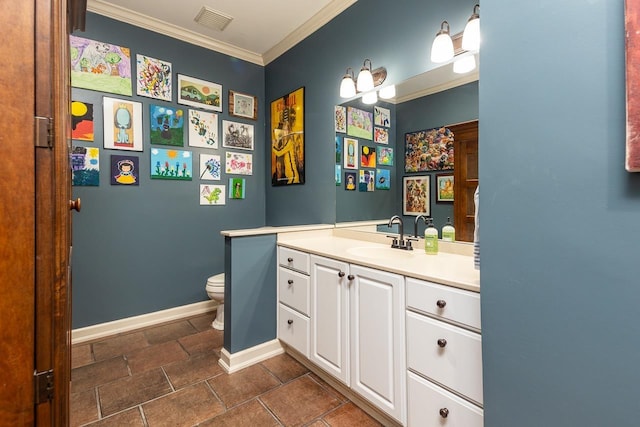 bathroom with toilet, crown molding, and vanity