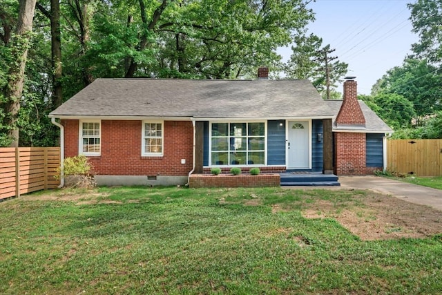 ranch-style house with a front lawn