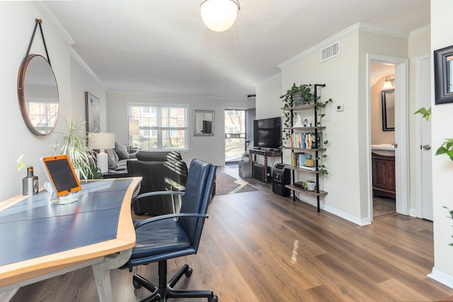 office space with ornamental molding and dark hardwood / wood-style floors