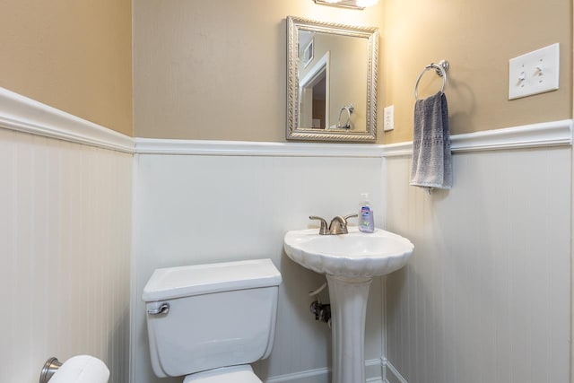 bathroom with toilet and sink