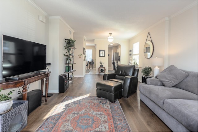 living room with crown molding and wood-type flooring