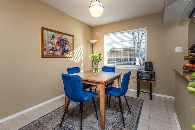 view of tiled dining space