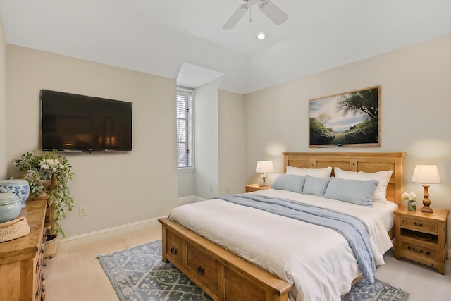 bedroom with ceiling fan and light hardwood / wood-style flooring