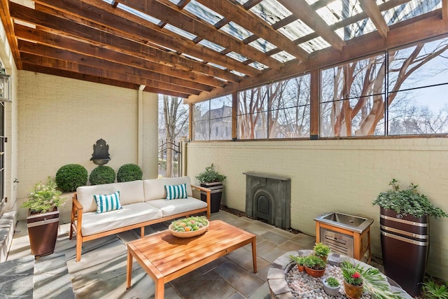 view of patio / terrace with a pergola and an outdoor hangout area