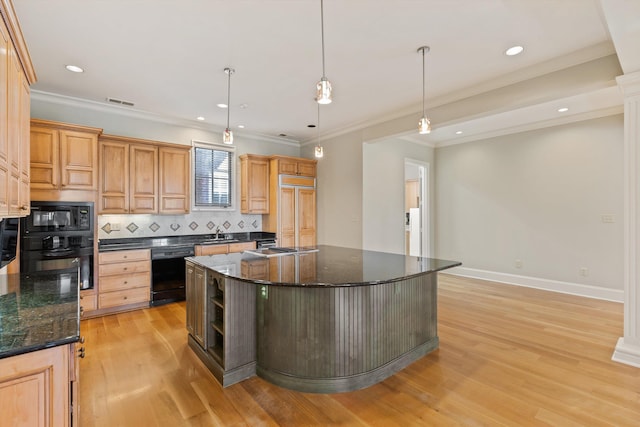 kitchen featuring a kitchen island, light wood-type flooring, black appliances, and hanging light fixtures