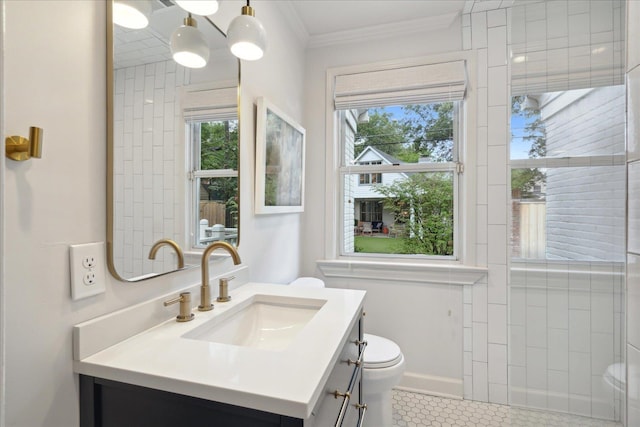 bathroom with ornamental molding, tile patterned floors, vanity, and toilet