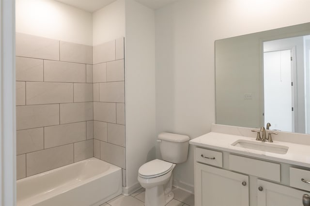 full bathroom with toilet, tiled shower / bath combo, tile patterned floors, and vanity