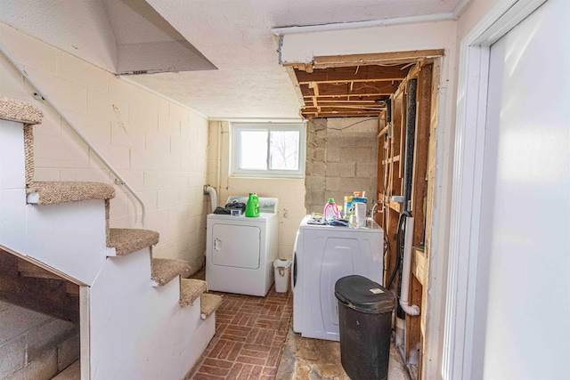 washroom with washer and clothes dryer