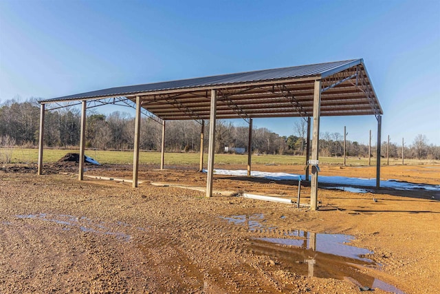 view of yard featuring a carport