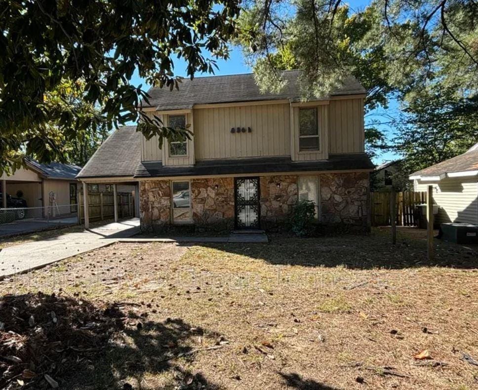 view of property featuring a carport