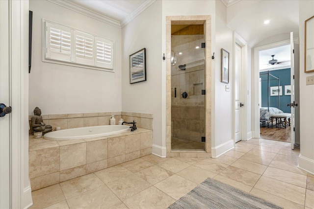 bathroom with ceiling fan, crown molding, and shower with separate bathtub