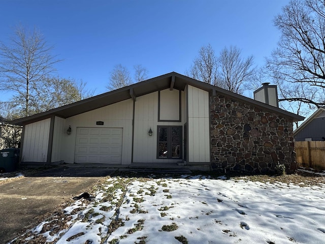 exterior space featuring a garage