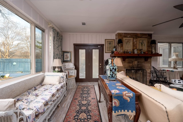 living room with ornamental molding