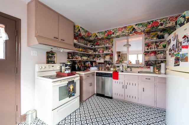 kitchen with sink and white appliances