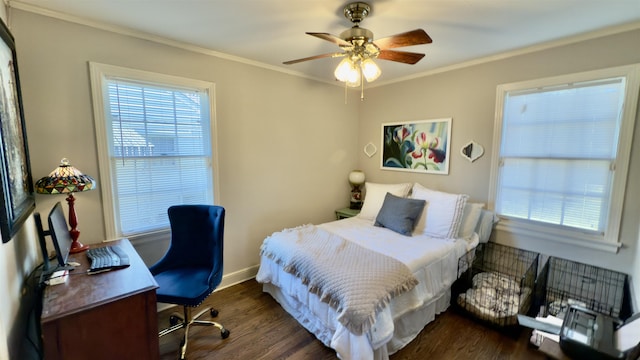 bedroom with ceiling fan, dark wood-type flooring, and ornamental molding