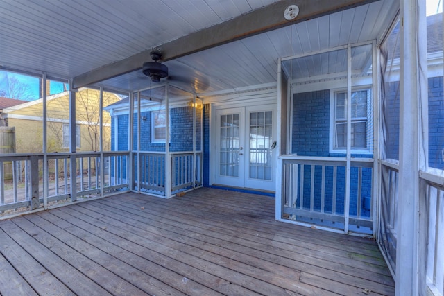 deck featuring ceiling fan and french doors