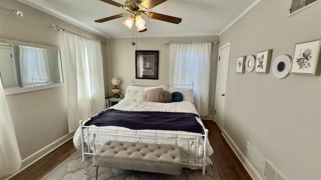 bedroom featuring ceiling fan, crown molding, and dark hardwood / wood-style flooring