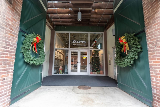 entrance to property featuring french doors