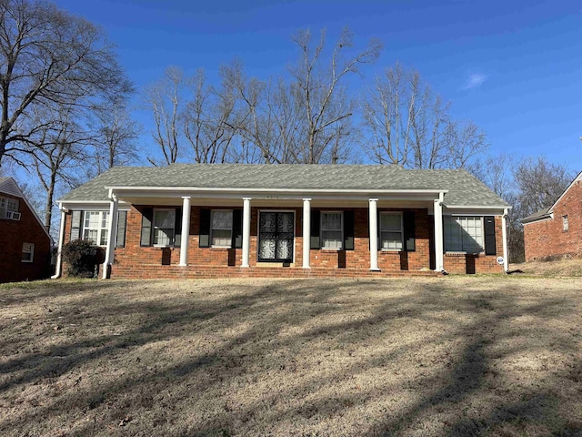 view of front of property featuring covered porch