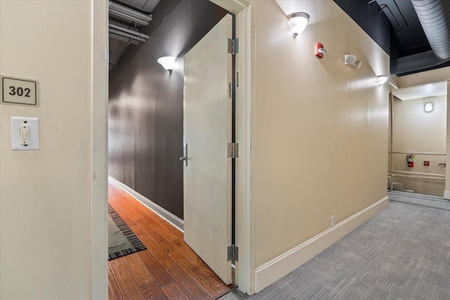 hall featuring hardwood / wood-style flooring